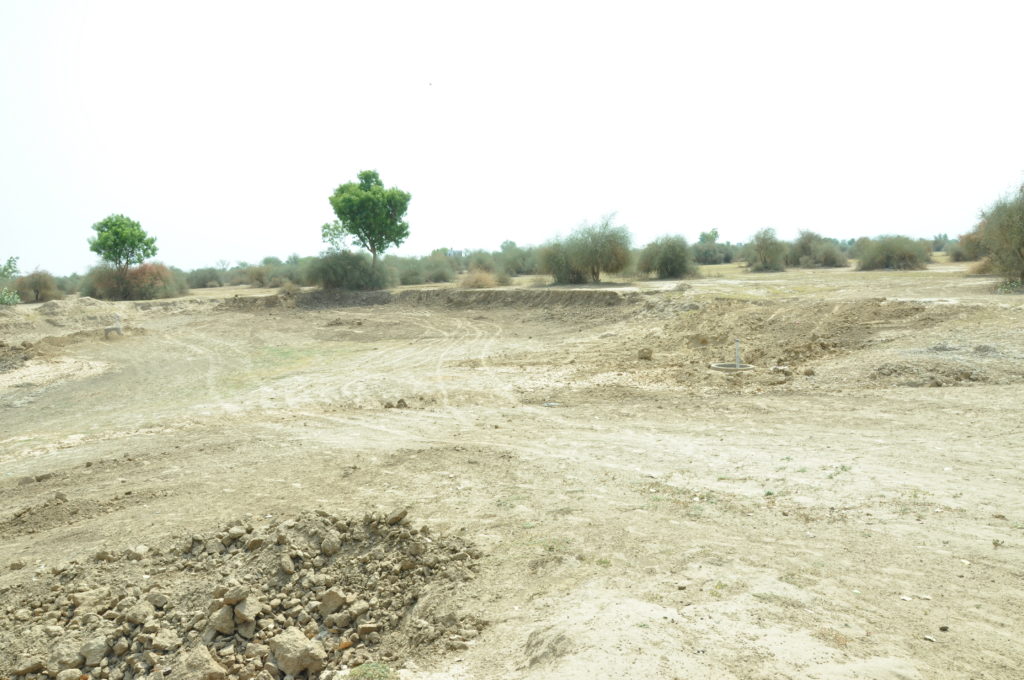 View of hardened non-permeable low-lying land